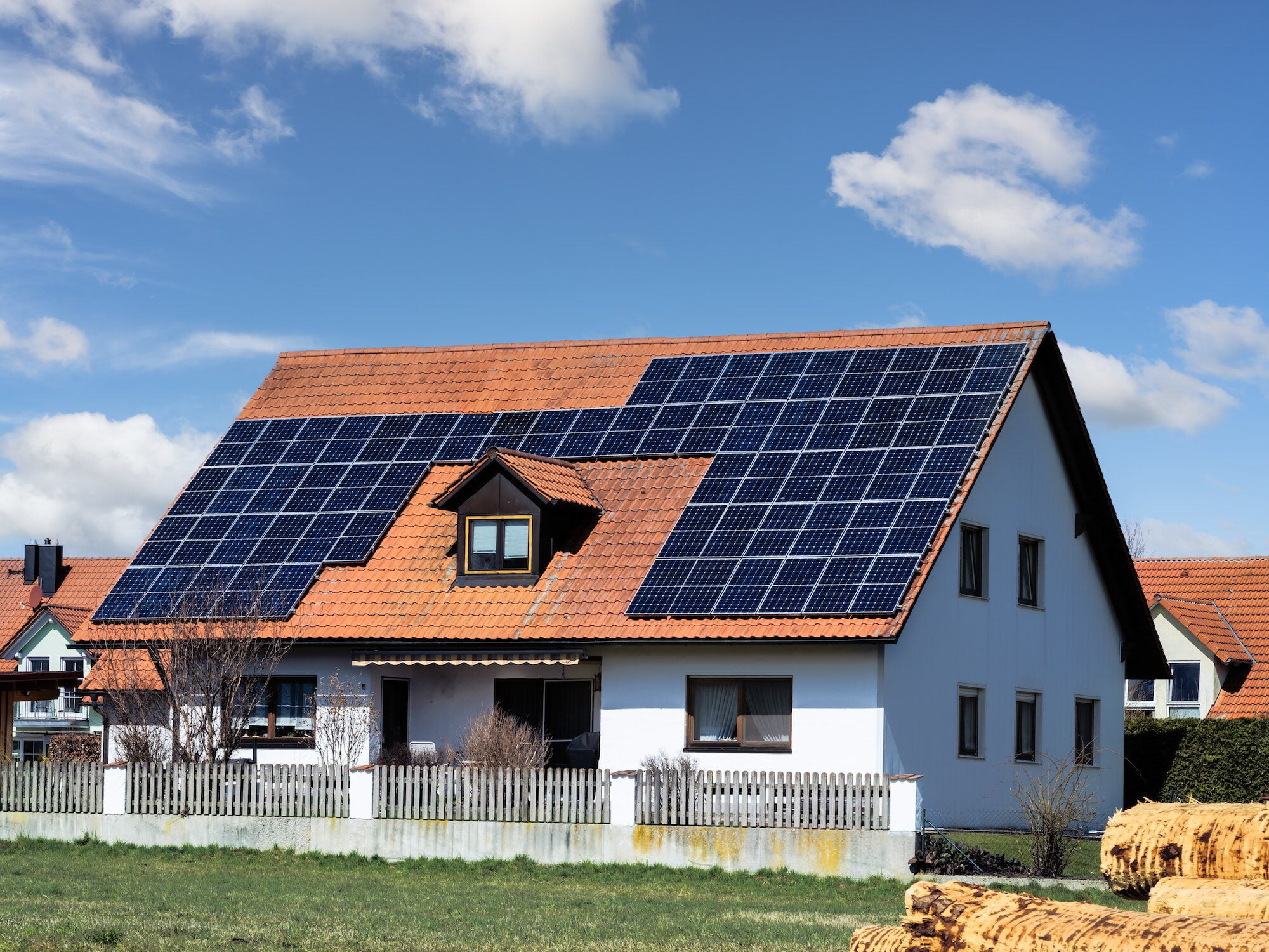 Innovative House with solar collectors- building modified by image editing